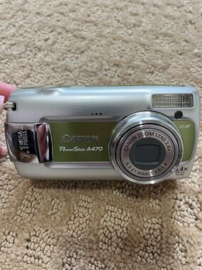 Canon Silver Digital Camera with Lime Green Accent